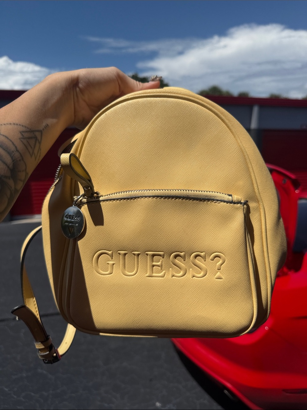 Guess Yellow Mini Backpack with Embossed Logo